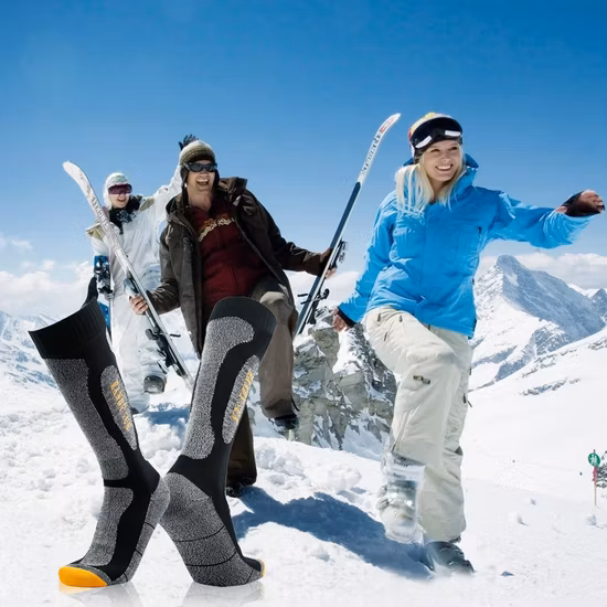 El deporte al aire libre de la rodilla de la prenda impermeable de alta calidad pega los calcetines unisex para correr, esquiar, escalar